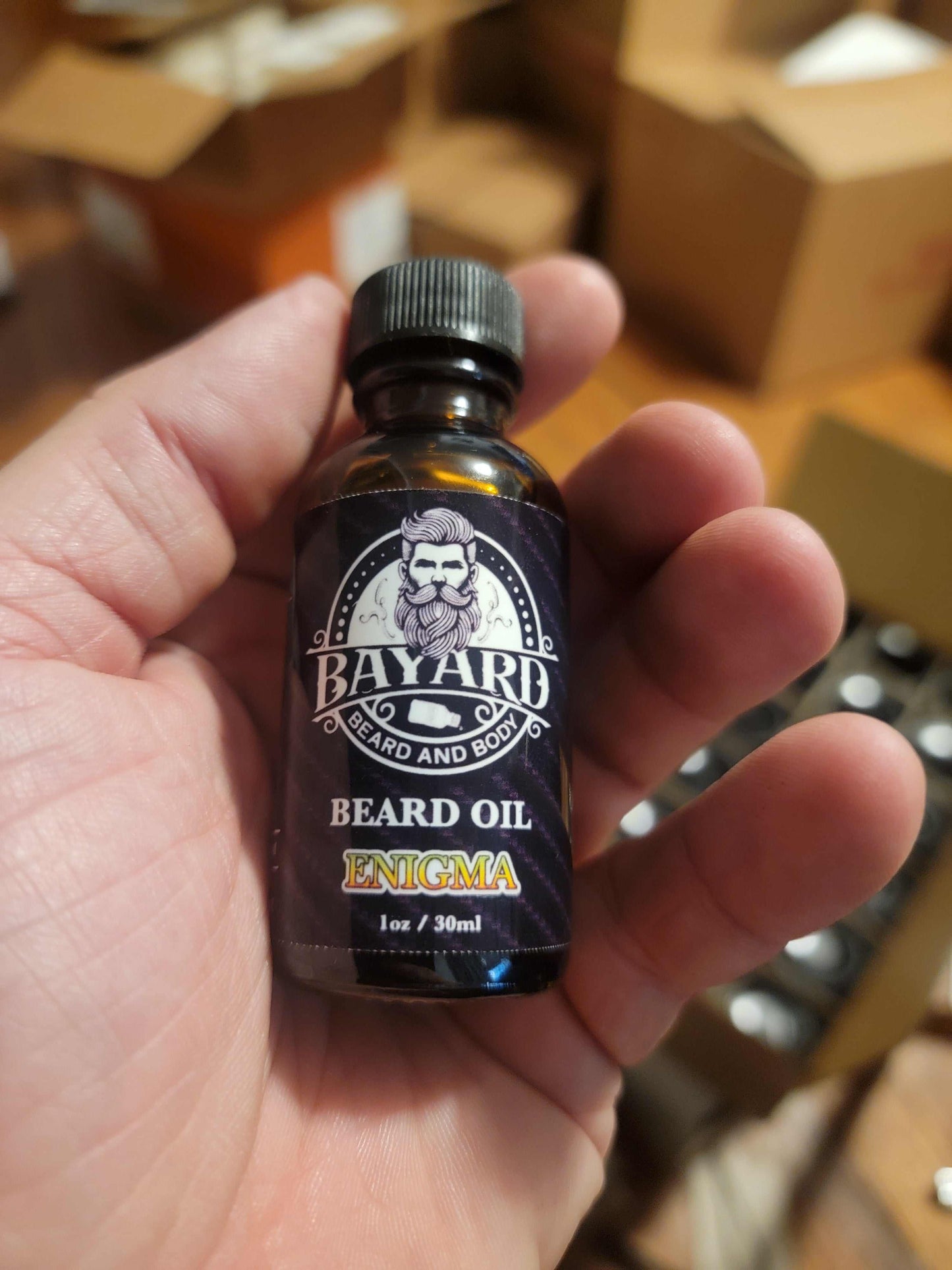 Enigma Beard Oil in a hand