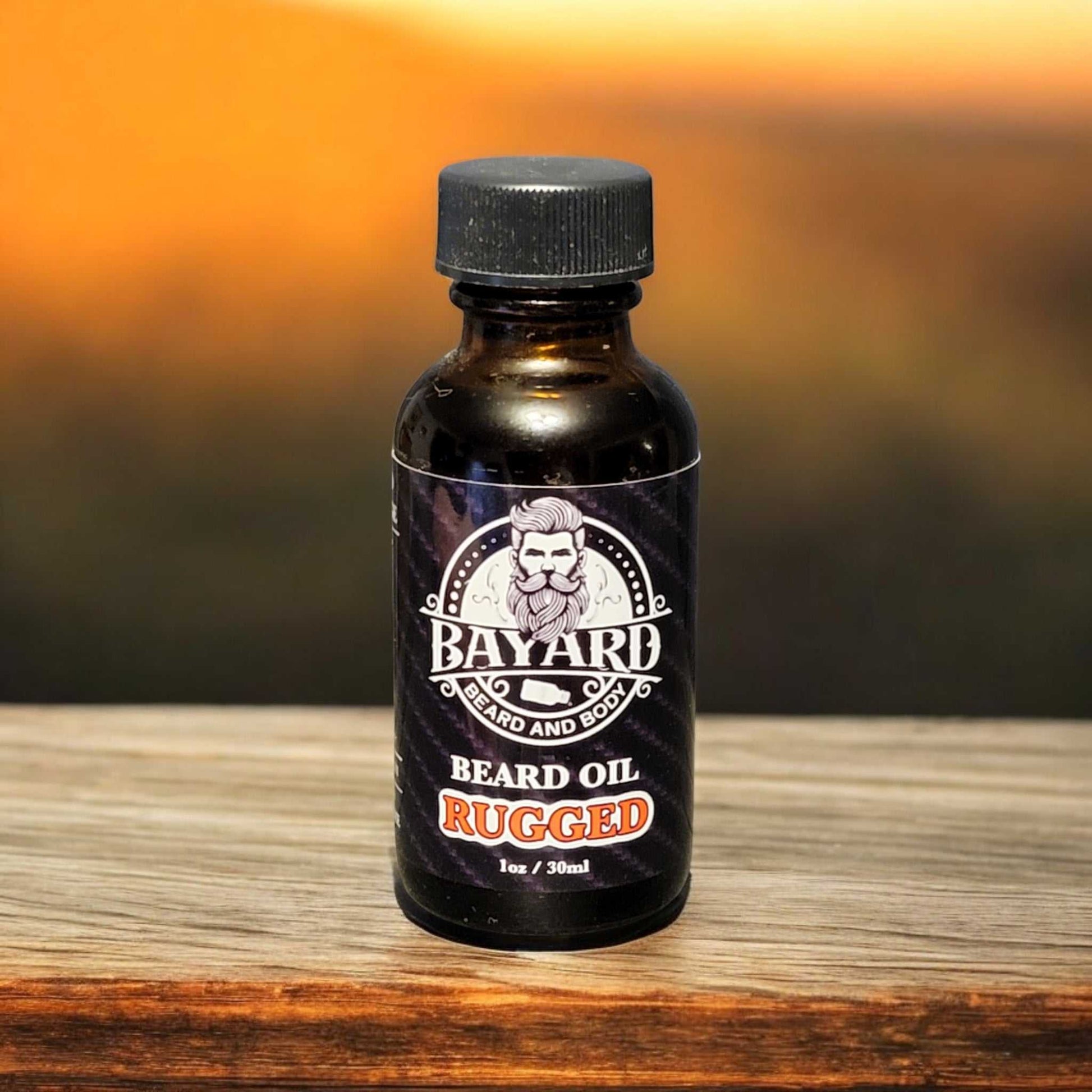 Rugged Beard Oil on a wood ledge during sunset