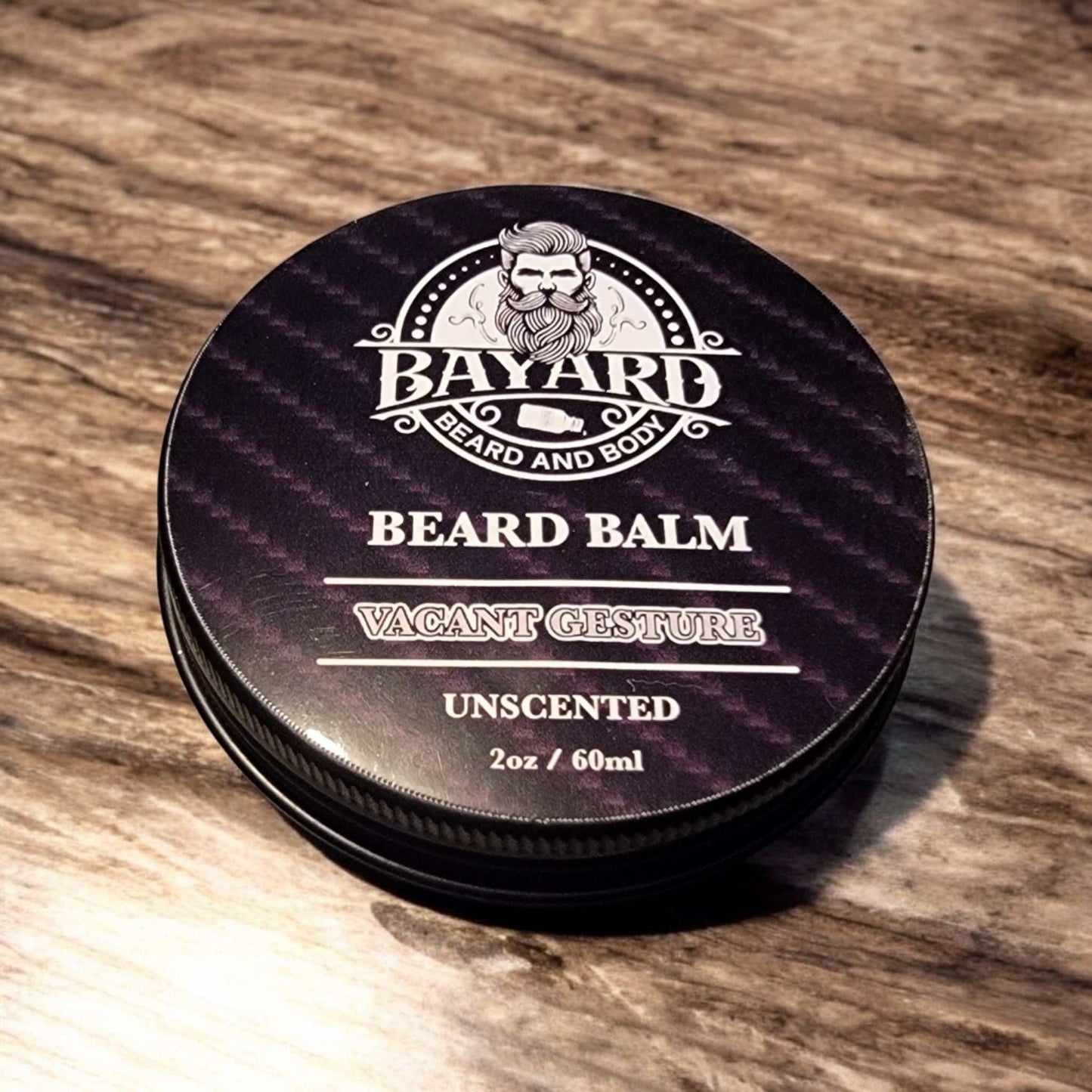 Vacant Gesture Beard Balm on a wood table