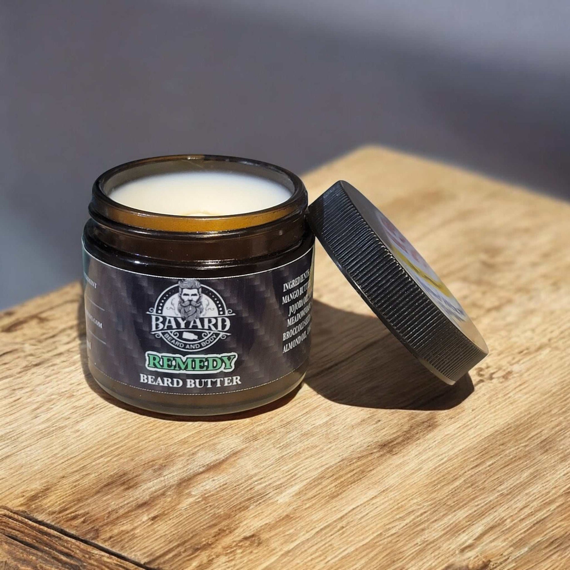 Remedy Beard Butter on a wood table 