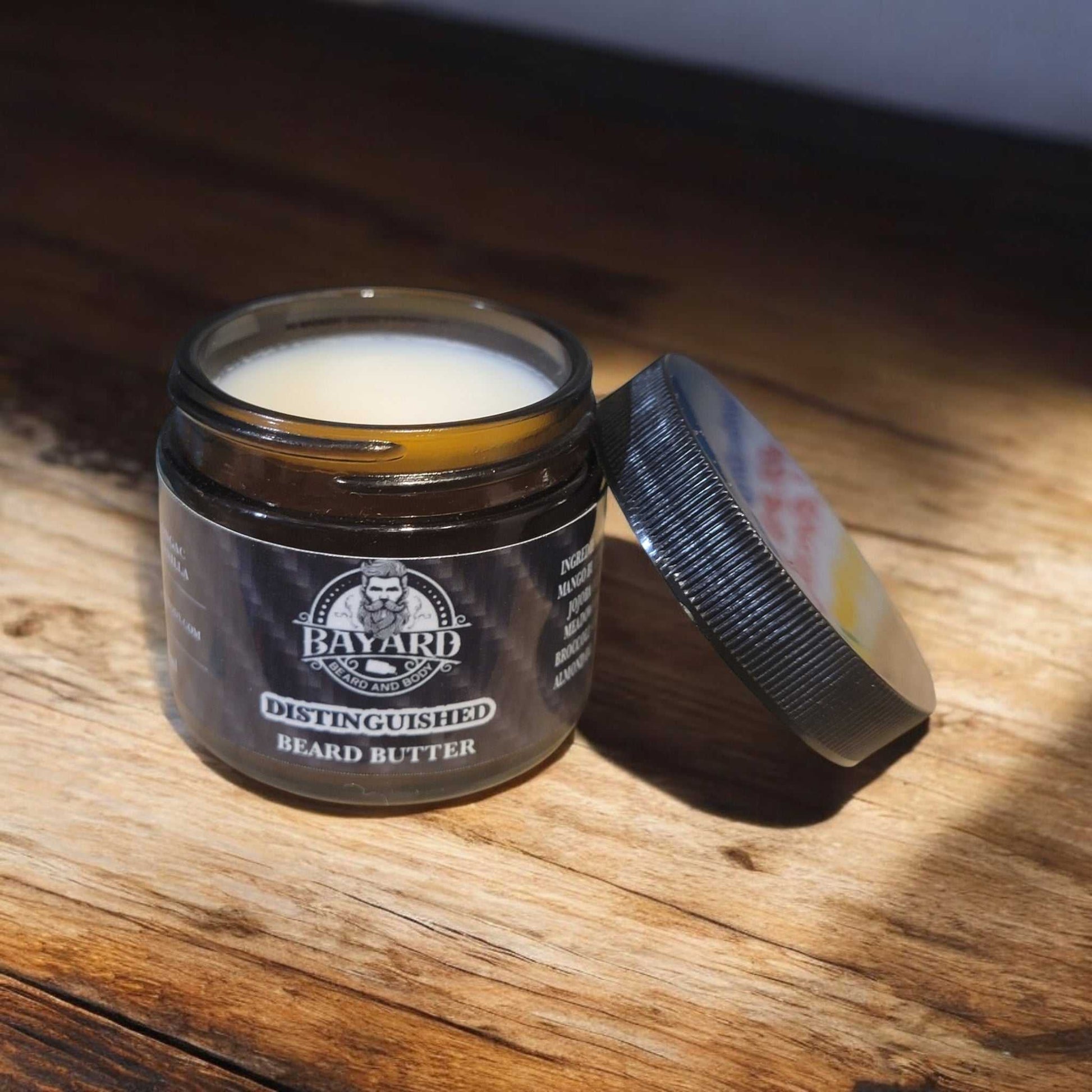 Distinguished Beard Butter on a oak table