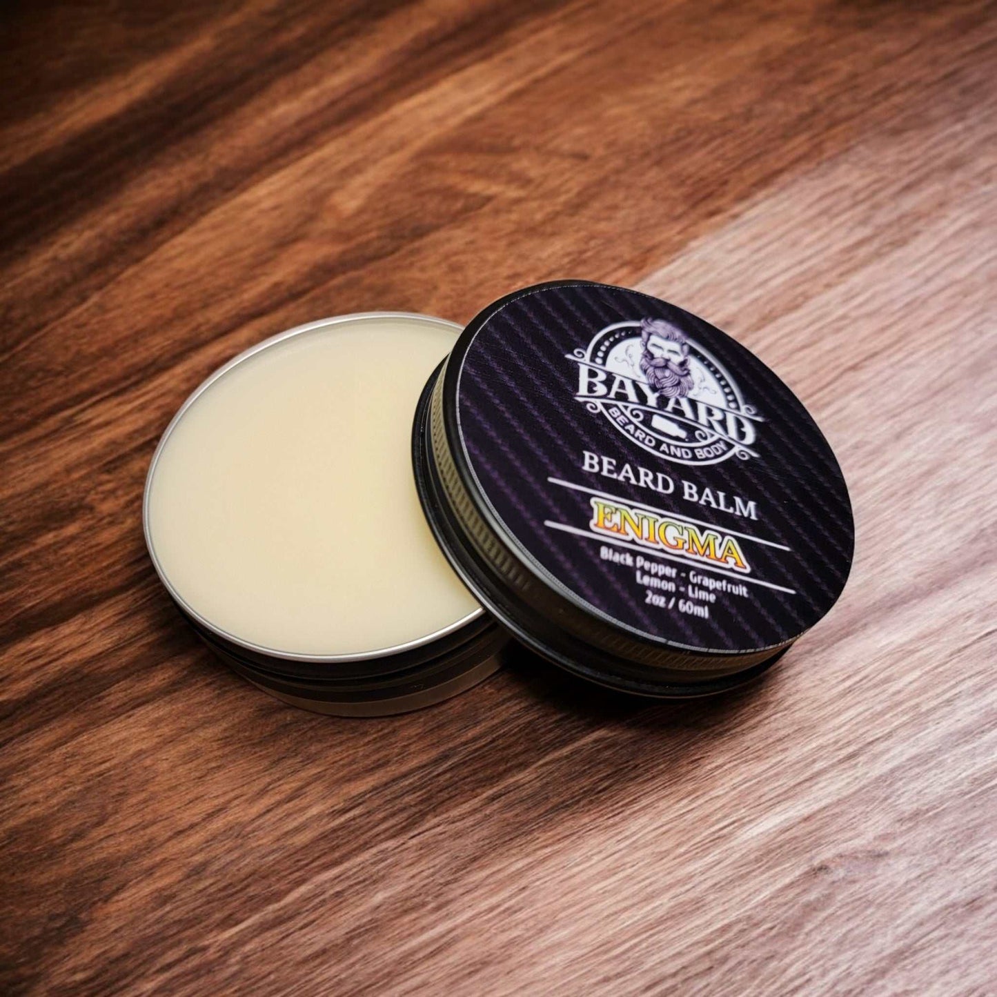 Enigma Beard Balm on a wood table